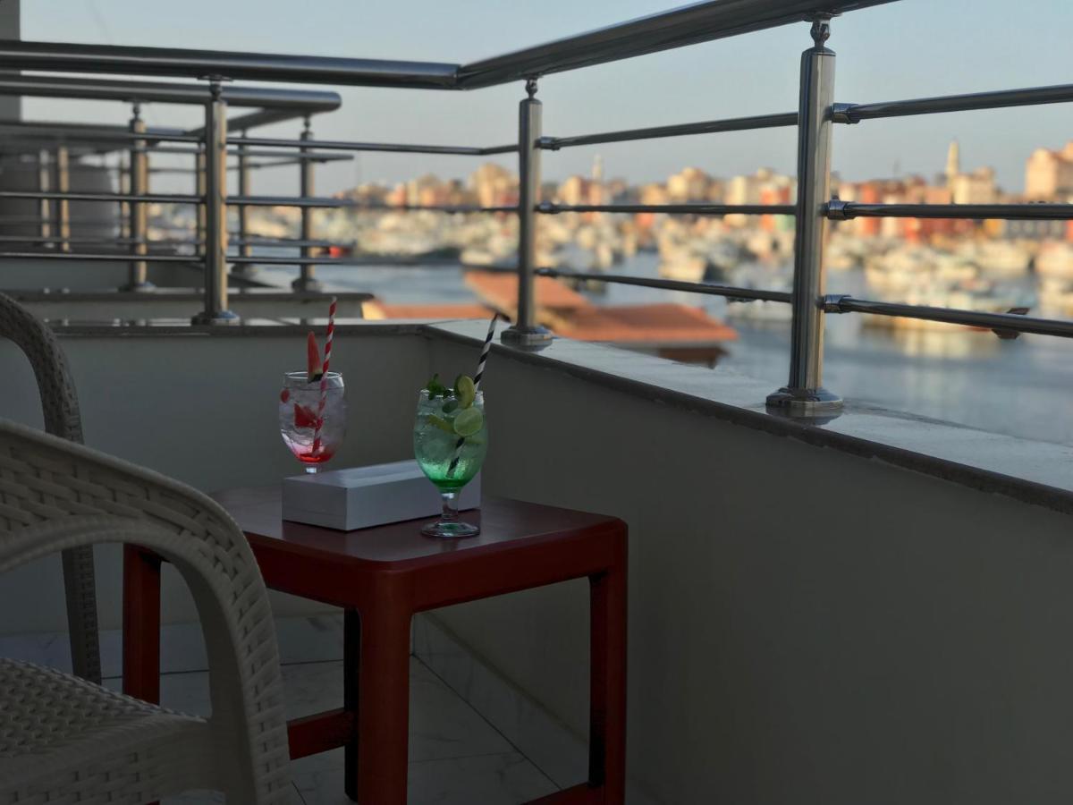 Dolphin Ras El-Bar Hotel Bagian luar foto