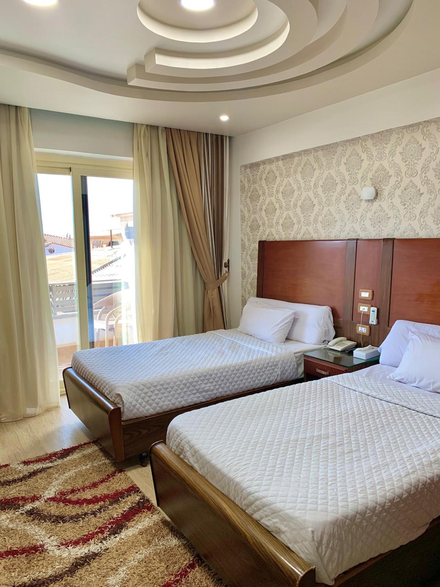 Dolphin Ras El-Bar Hotel Bagian luar foto