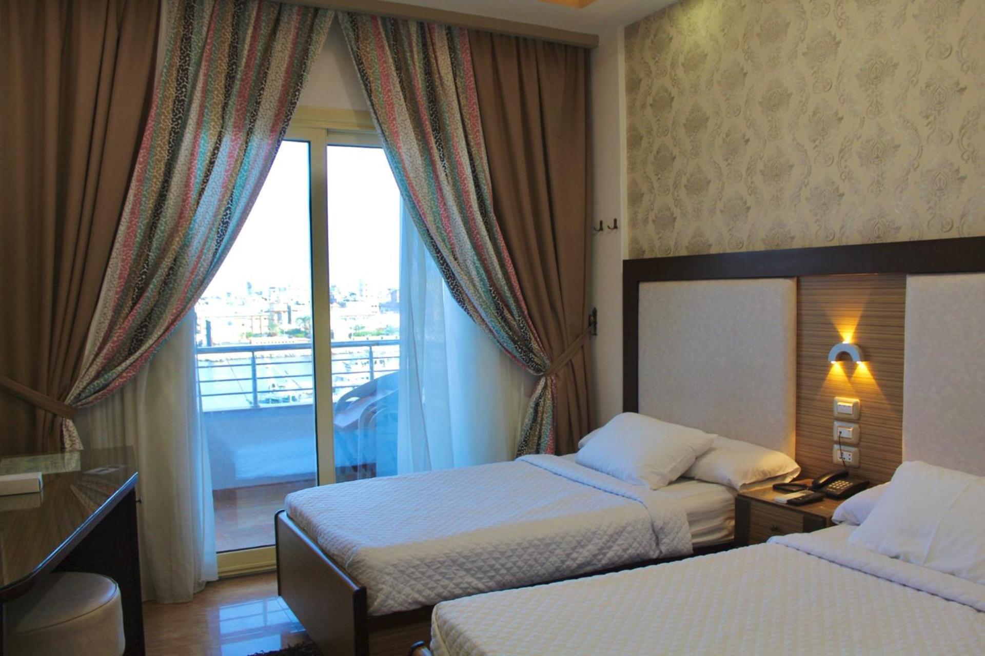 Dolphin Ras El-Bar Hotel Bagian luar foto